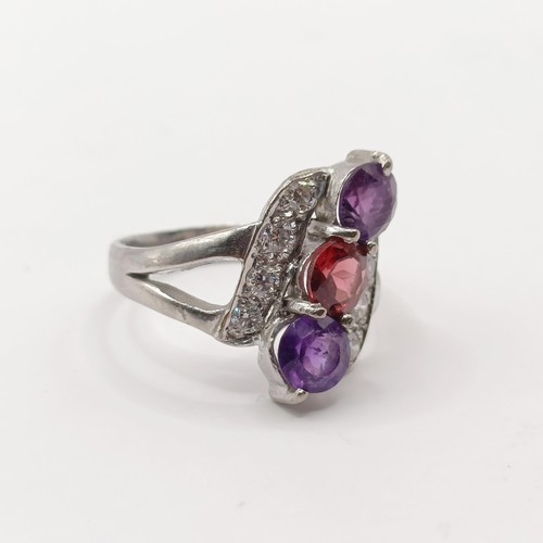 369 - An 18ct white gold, diamond and multi-coloured stone ring, ring size J