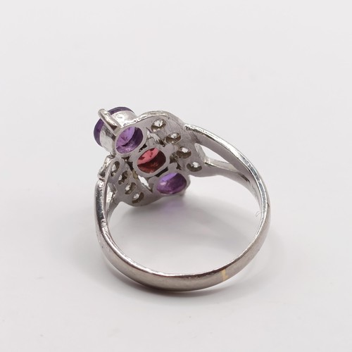 369 - An 18ct white gold, diamond and multi-coloured stone ring, ring size J