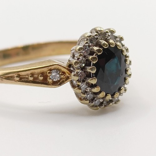 372 - A 9ct gold and diamond half hoop ring, ring size L, and a 9ct gold, blue and white stone ring, ring ... 