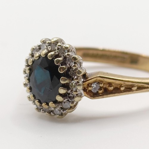 372 - A 9ct gold and diamond half hoop ring, ring size L, and a 9ct gold, blue and white stone ring, ring ... 