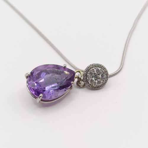 378 - A platinum, amethyst and diamond pendant, and chain