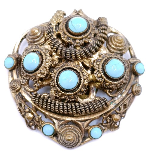 381 - A yellow metal, red and white stone gypsy set ring, a gilt metal and turquoise brooch, and a vintage... 