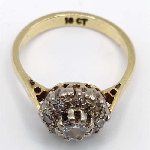 384 - An 18ct gold and diamond cluster ring, ring size K