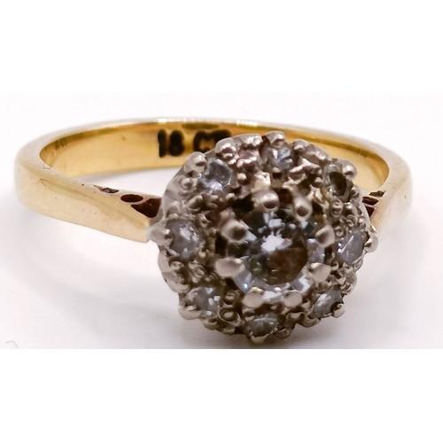 384 - An 18ct gold and diamond cluster ring, ring size K