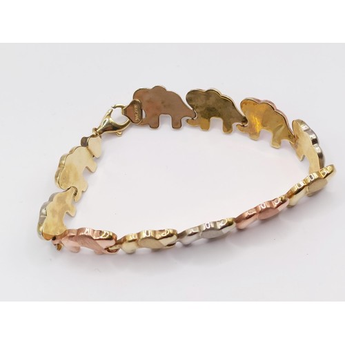 385 - A 10ct multi-coloured gold bracelet, in the form of an elephant train, 8.4 g