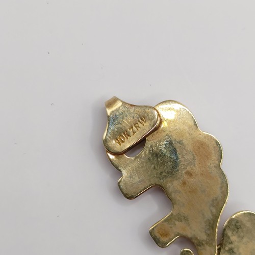 385 - A 10ct multi-coloured gold bracelet, in the form of an elephant train, 8.4 g