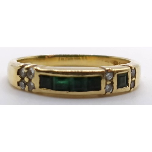 396 - An 18ct gold, green and white stone ring, ring size J