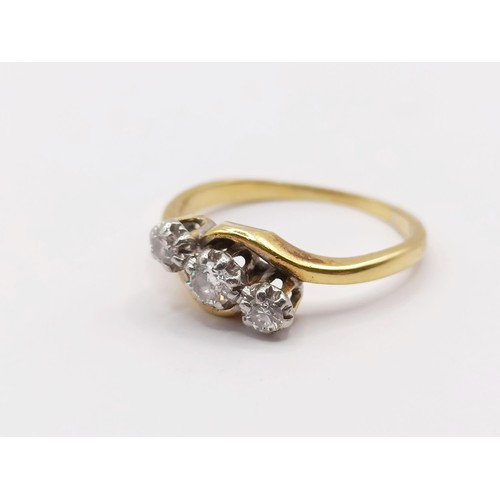 403 - An 18ct gold and diamond three stone ring, ring size J