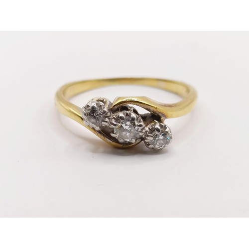 403 - An 18ct gold and diamond three stone ring, ring size J