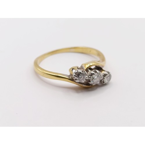 403 - An 18ct gold and diamond three stone ring, ring size J