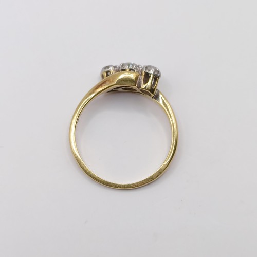 403 - An 18ct gold and diamond three stone ring, ring size J