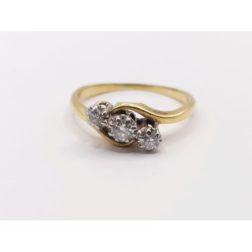 403 - An 18ct gold and diamond three stone ring, ring size J