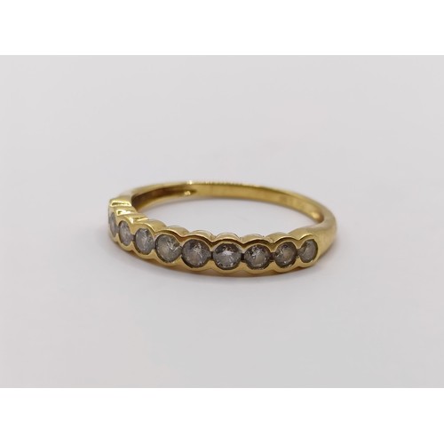 405 - An 18ct gold and diamond half eternity ring, ring size P