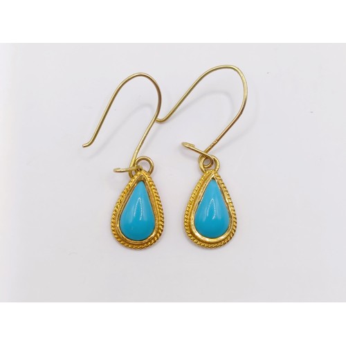 406 - A pair of 14ct gold and turquoise earrings