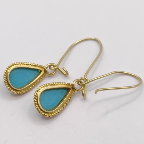 406 - A pair of 14ct gold and turquoise earrings