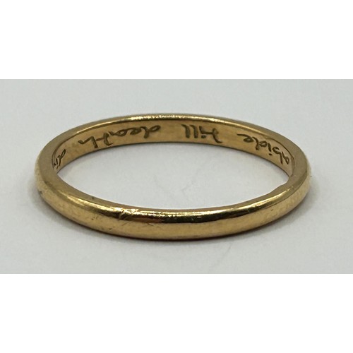 412 - A 22ct gold wedding band, ring size M, 2.7 g