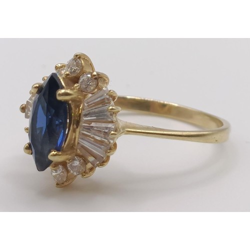 413 - A 9ct gold, blue and white stone cluster ring