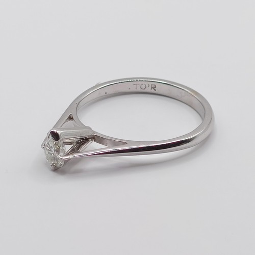 423 - A platinum and pear shaped diamond solitaire ring, ring size K