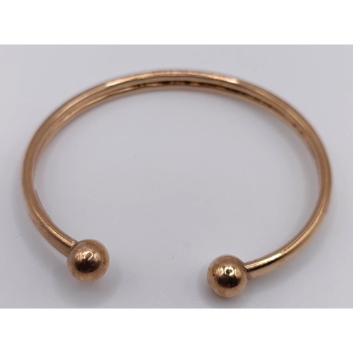 428 - A 9ct gold torc, 2.8 g