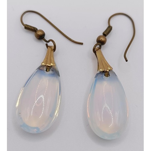 429 - A pair of yellow coloured metal and moonstone style drop earrings