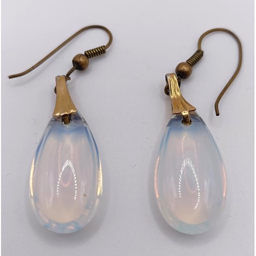 429 - A pair of yellow coloured metal and moonstone style drop earrings