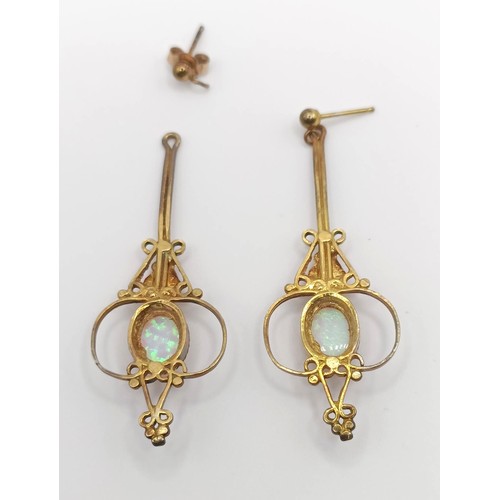 447 - A pair of Indian yellow coloured metal and opal drop earrings