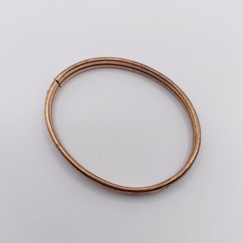 448 - A 9ct gold bangle, 6.2 g