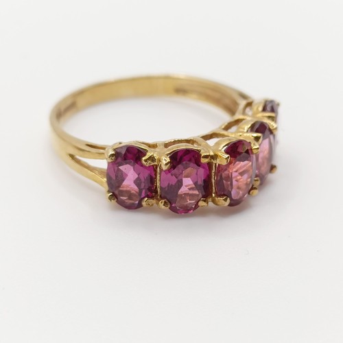 449 - A 9ct gold and blue stone cluster ring, ring size I, and a 9ct gold and pink stone ring, ring size R... 