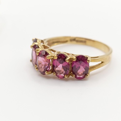 449 - A 9ct gold and blue stone cluster ring, ring size I, and a 9ct gold and pink stone ring, ring size R... 