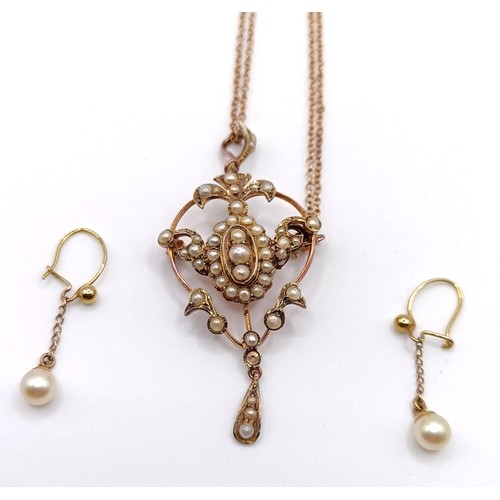 486 - An early 20th century rose gold and seed pearl pendant, with a chain, and a pair of pearl earrings, ... 