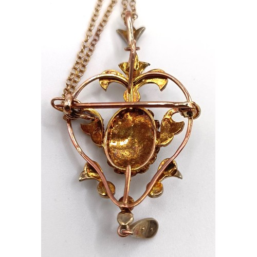 486 - An early 20th century rose gold and seed pearl pendant, with a chain, and a pair of pearl earrings, ... 