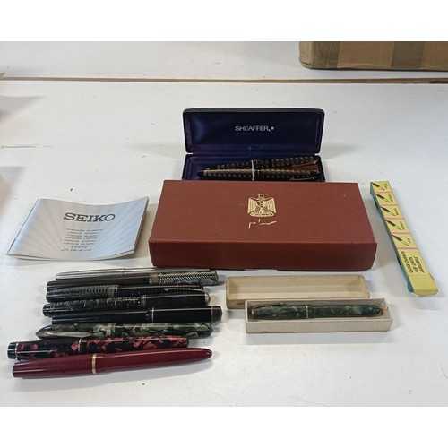 552 - A Dinky fountain pen, boxed, other fountain pens and fountain pen boxes