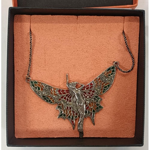 561 - An Art Nouveau style necklace, in the form of a fairy, two similar brooches and assorted other costu... 