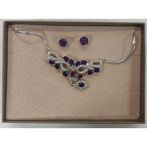 563 - A Dinny Hall purple and white stone necklace, and matching ear studs, boxed, and assorted other cost... 