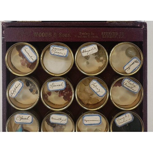 567 - An unusual early 20th century cased set of uncut gems, retail mark for Woods & Son