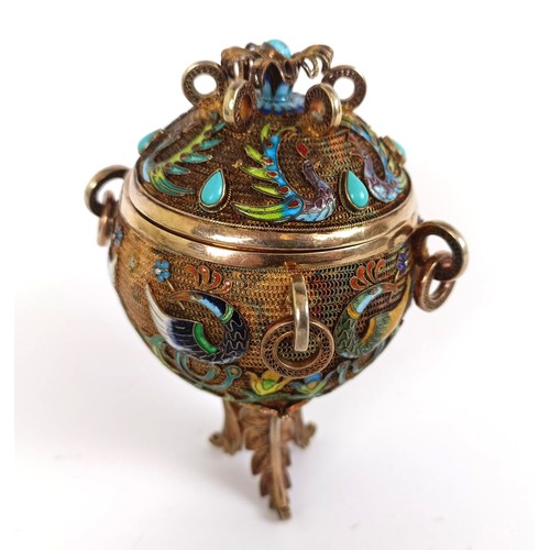 155 - A gilt metal and enamel spice box, decorated birds, 10 cm wide