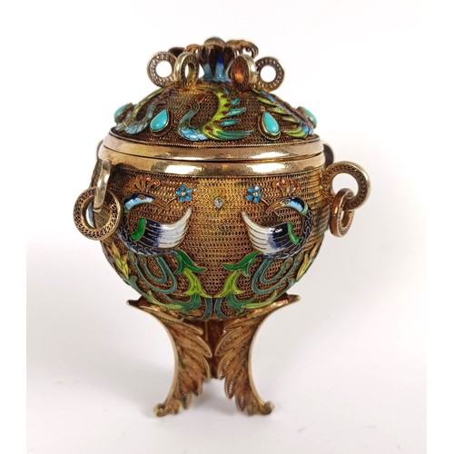 155 - A gilt metal and enamel spice box, decorated birds, 10 cm wide