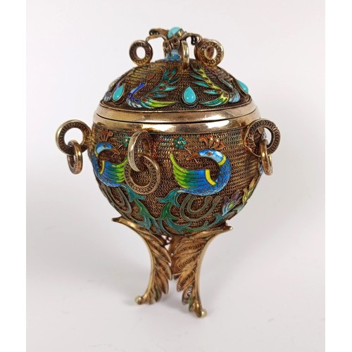 155 - A gilt metal and enamel spice box, decorated birds, 10 cm wide