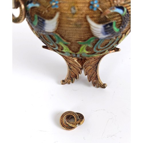 155 - A gilt metal and enamel spice box, decorated birds, 10 cm wide