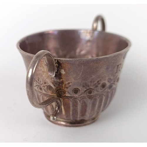 72 - An 18th century silver toy porringer, initialed, with embossed and fluted decoration, makers mark on... 