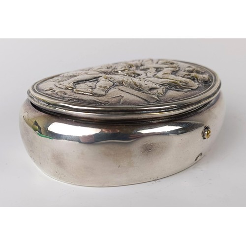 133 - A Dutch silver coloured metal oval tobacco box, the lid decorated a tavern scene, 10 cm wide