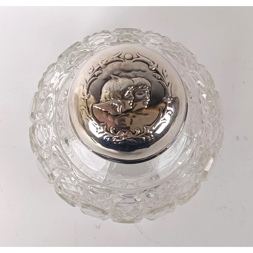 138 - A Edwardian VII silver and cut glass scent bottle, the lid embossed cherubs,  Birmingham 1906, ... 