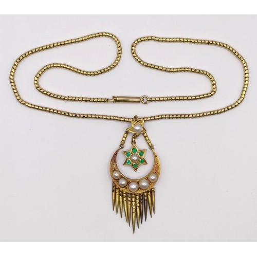 366 - A 15ct gold, emerald and seed pearl tassel pendant, on a chain