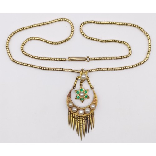 366 - A 15ct gold, emerald and seed pearl tassel pendant, on a chain