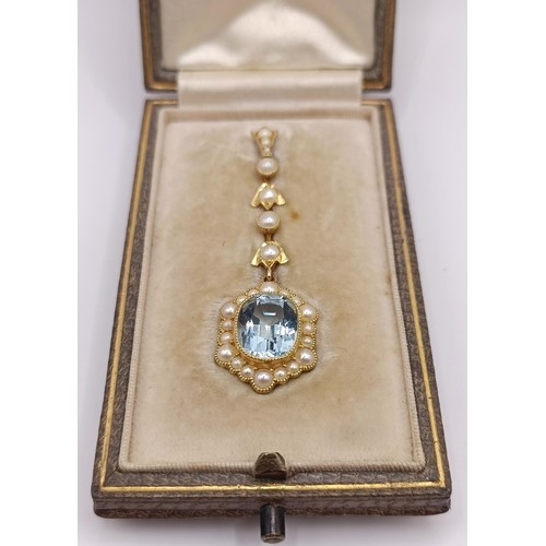 376 - A pale blue and pearl pendant, in a vintage jewellery box, and a pair of red stone earrings, in a vi... 