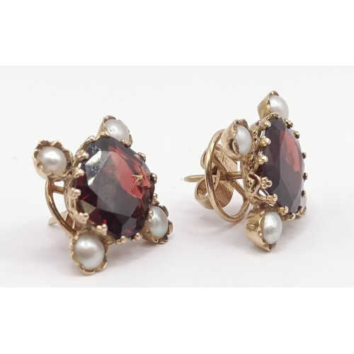 386 - A pair of 9ct gold, garnet and pearl earrings