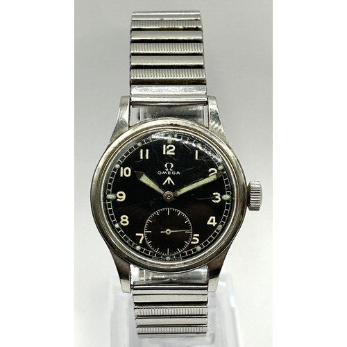 586 - A gentleman's stainless steel Omega military issue wristwatch, the black dial with Arabic numerals a... 