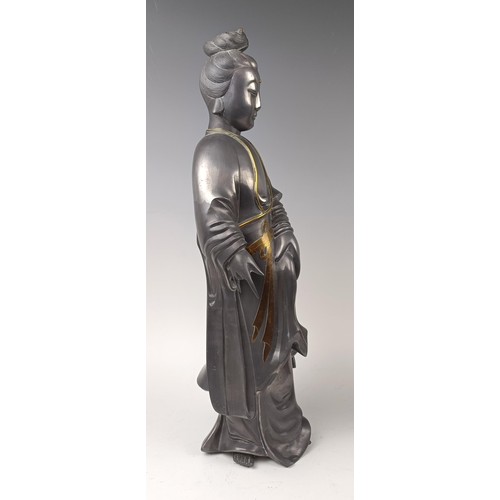 1012 - A Chinese pewter figure, 53 cm high, a bronzed figure, 30 cm and a wooden figure, 32 cm (3)