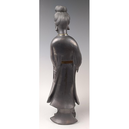 1012 - A Chinese pewter figure, 53 cm high, a bronzed figure, 30 cm and a wooden figure, 32 cm (3)