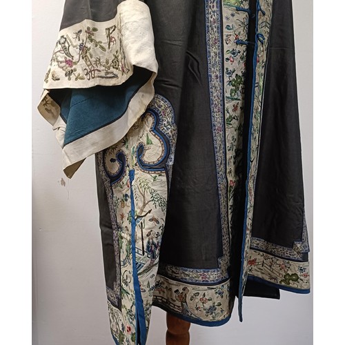 992 - A vintage Chinese robe, collar and sleeves embroidered figures in a landscape